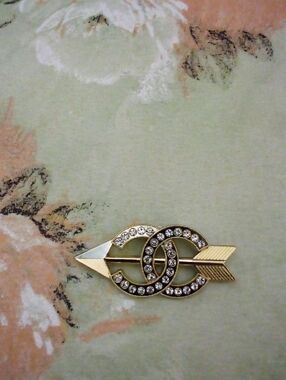 Gold-Tone Crystal CC Arrow Brooch